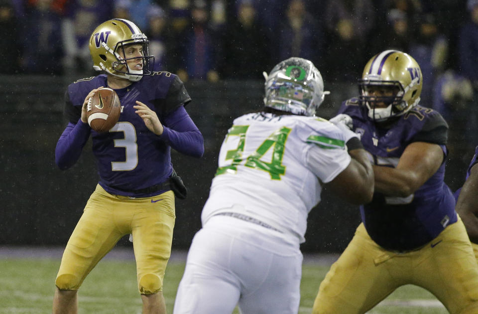 Washington quarterback Jake Browning (3) passes against Oregon in the first half of an NCAA college football game, Saturday, Nov. 4, 2017, in Seattle. (AP Photo/Ted S. Warren)