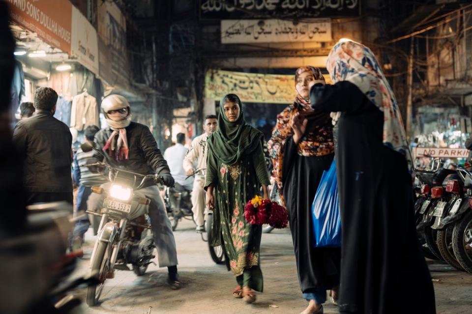 On a good day Fatima earns just £1.50 from selling flowers (Paddy Dowling)