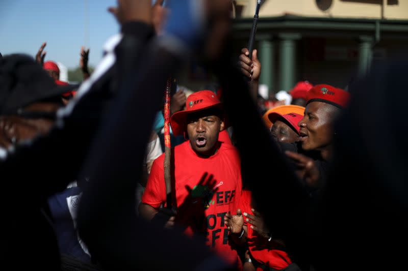 Members of the Economic Freedom Fighters (EFF) protest outside the Senekal magistrate's court