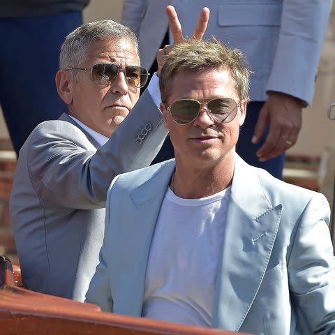 <p>Rocco Spaziani/UPI/Shutterstock</p> George Clooney and Brad Pitt