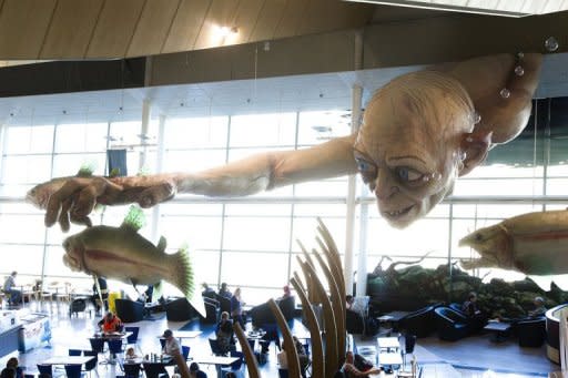 A giant Gollum creature from "The "Hobbit" movie catches a fish on the ceiling of Wellington airport on October 31, 2012. The producers of "The Hobbit" movies have rejected allegations from animal rights group PETA that animals have died during the making of the highly anticipated Tolkien trilogy in New Zealand