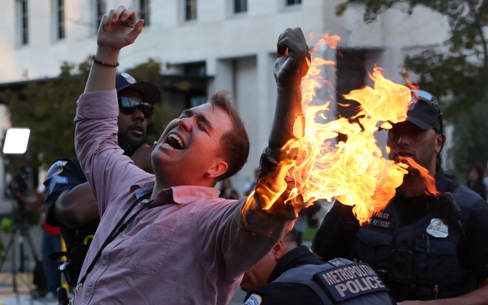 A journalist with CBS News self-immolates while yelling "Free Palestine" at a demonstration for Palestine and Lebanon, Washington, DC