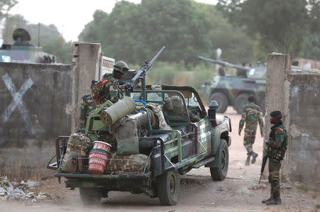 ECOWAS soldiers are seen carrying out a patrol at the border of Gambia in Karang, Senegal January 20, 2017. REUTERS/Thierry Gouegnon