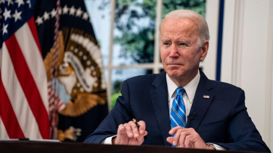 President Joe Biden and the White House COVID-19 Response Team participate in a virtual call with the National Governors Association from the South Court Auditorium of the Eisenhower Executive Office Building of the White House Complex on Monday, Dec. 27, 2021 in Washington, DC. (Kent Nishimura / Los Angeles Times via Getty Images)