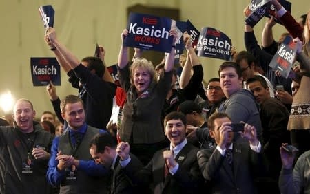 Supporters of Republican U.S. presidential candidate John Kasich celebrate at his election night rally in Berea, Ohio, March 15, 2016. REUTERS/Aaron P. Bernstein