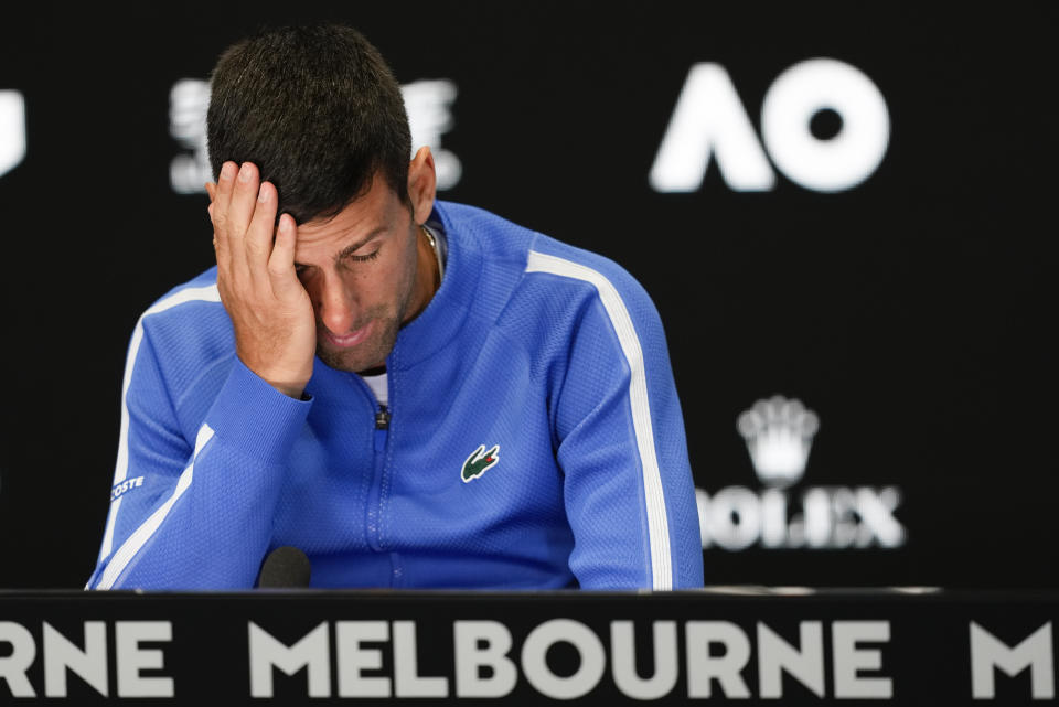 Novak Djokovic of Serbia reacts during a press conference following his loss to Jannik Sinner of Italy in their semifinal at the Australian Open tennis championships at Melbourne Park, Melbourne, Australia, Friday, Jan. 26, 2024. (AP Photo/Louise Delmotte)