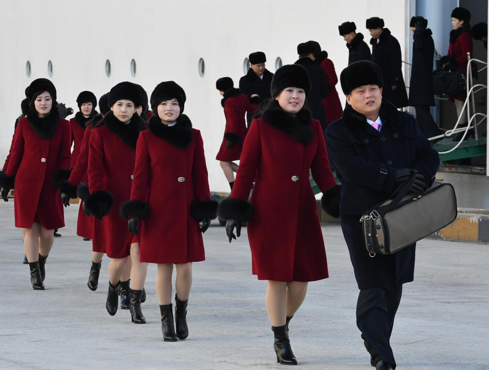 A delegation of North Korean cheerleaders arrive in South Korea ahead of the 2018 Winter Olympics in PyeongChang. (Getty)