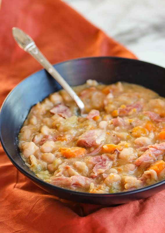 <p>Lisa's Dinnertime Dish</p><p>Ham bone and navy bean soup is type of fare that will warm you up on a cold winter day and make you feel all homey and good.</p><p><strong>Get the recipe: <a href="https://lisasdinnertimedish.com/slow-cooker-ham-bone-and-navy-bean-soup/" rel="nofollow noopener" target="_blank" data-ylk="slk:Ham Bone and Navy Bean Soup;elm:context_link;itc:0;sec:content-canvas" class="link ">Ham Bone and Navy Bean Soup</a></strong></p><p><strong>Related: <a href="https://www.yahoo.com/lifestyle/100-best-side-dishes-easter-193105425.html" data-ylk="slk:100 Side Dishes For Ham;elm:context_link;itc:0;sec:content-canvas;outcm:mb_qualified_link;_E:mb_qualified_link;ct:story;" class="link  yahoo-link">100 Side Dishes For Ham</a></strong></p>