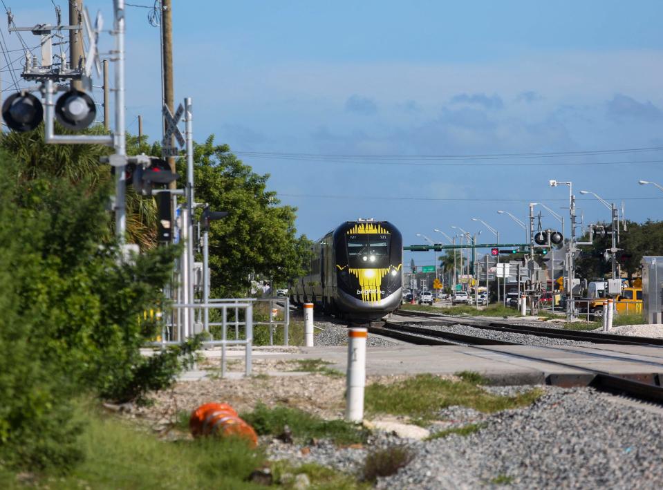 A Brightline train passes through downtown Vero Beach, Friday, Sept. 22, 2023. Brightline's South Florida high-speed train service travels to and from the new Brightline Orlando Train Station starting Friday morning.