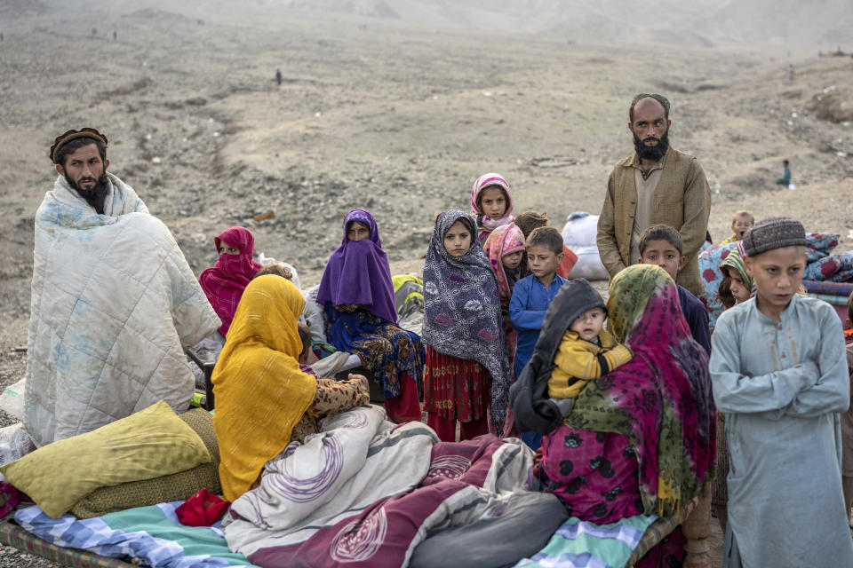 Afghan refugees settle in a camp near the Torkham Pakistan-Afghanistan border in Torkham, Afghanistan, Saturday, Nov. 4, 2023. A huge number of Afghans refugees entered the Torkham border to return home hours before the expiration of a Pakistani government deadline for those who are in the country illegally to leave or face deportation. (AP Photo/Ebrahim Noroozi)