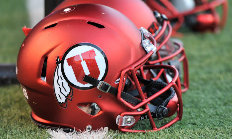 A closeup of a Utah Utes football helmet.