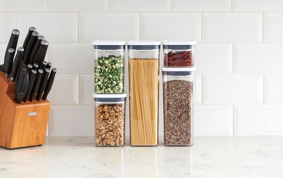 stackable canisters with dry foods inside