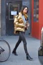 <p>We are totally feeling this 90s metallic puffer jacket. [Photo: Getty] </p>