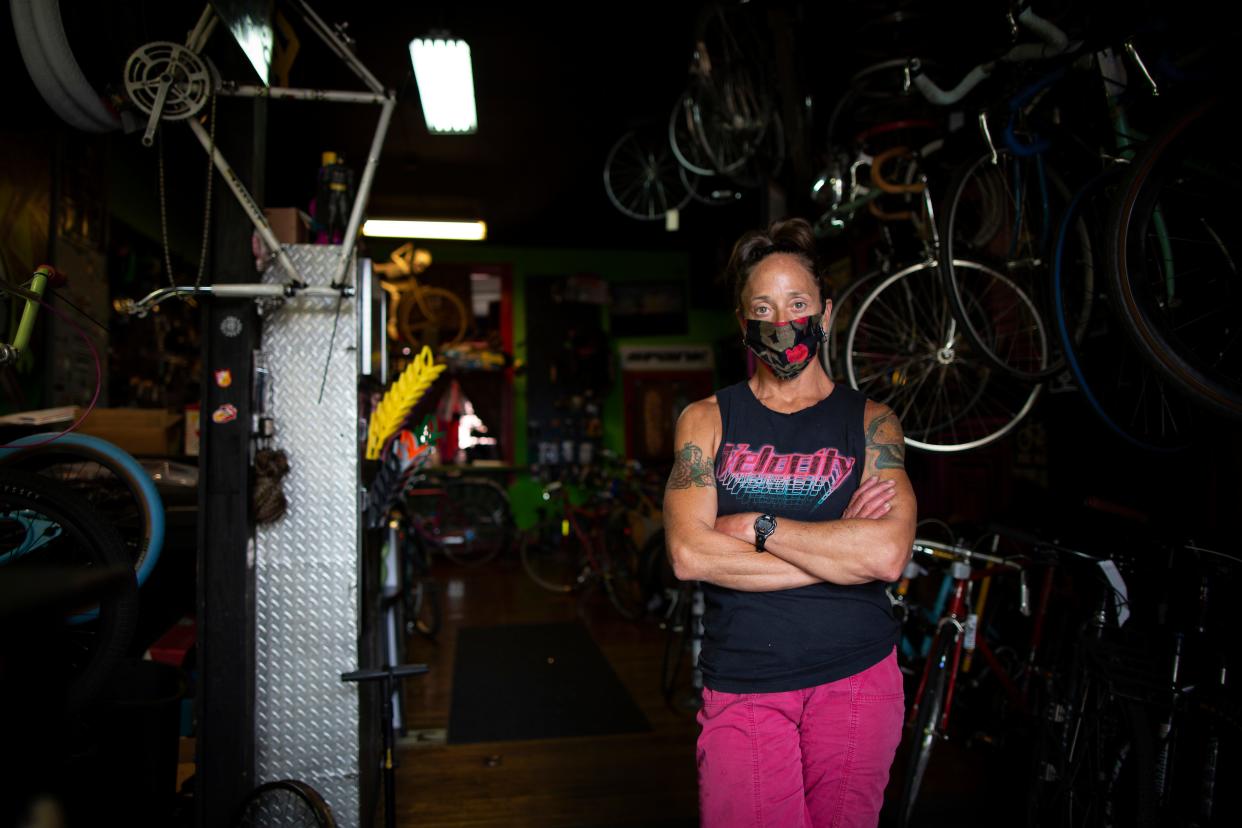 Owner Judi LoPresti poses at Spun Bicycles in the Northside neighborhood of Cincinnati on Wednesday, Aug. 5, 2020