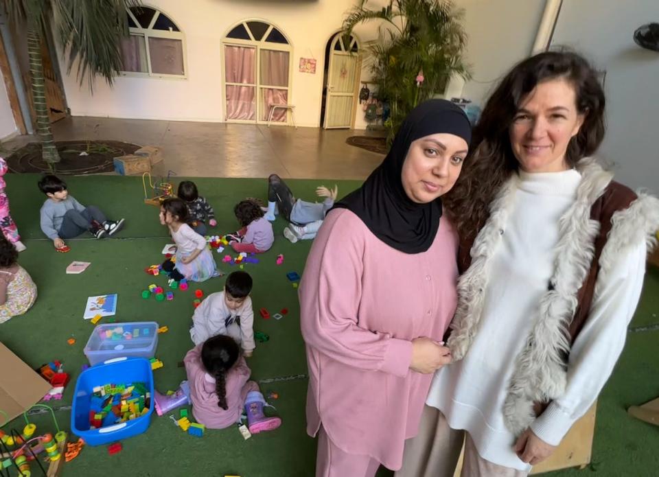 Ora Balha, right, co-founder of Orchard of Abraham's school, which has 55 employees and 220 students. With her, in hijab, is Amal Siksek, who has been a teacher at Orchard since it opened 16 years ago.