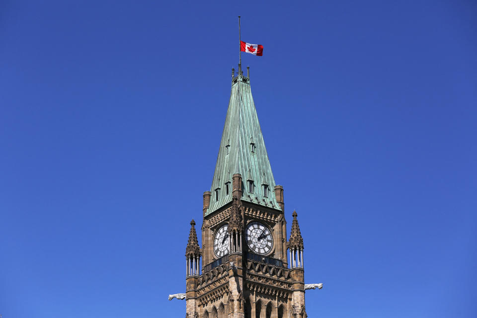 <p>A Canadian flag flies at half-staff at the top of the Peace Tower after the death of Britian's Queen Elizabeth II on September 8, 2022 in Ottawa. - Canadian Prime Minister Justin Trudeau paid tribute to Queen Elizabeth II, saying the late head of state for both Britain and this Commonwealth nation will "forever remain an important part" of Canada's history. (Photo by Dave Chan / AFP) (Photo by DAVE CHAN/AFP via Getty Images)</p> 
