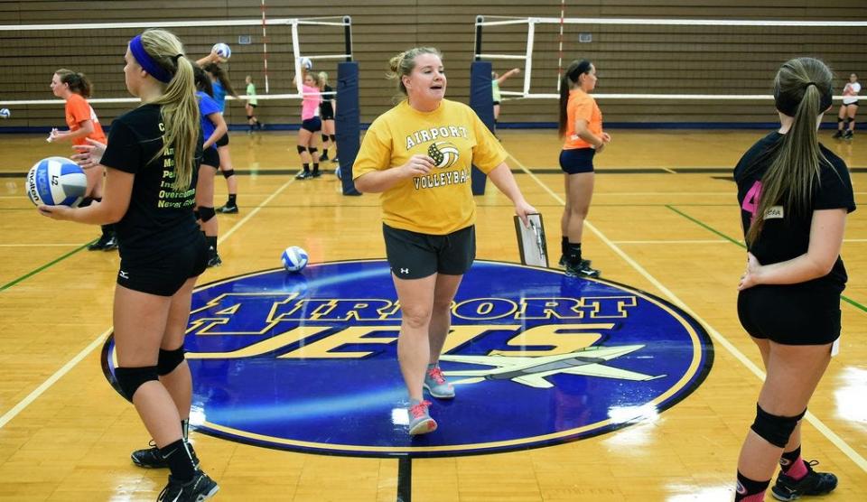 Stephanie Miller leads an Airport volleyball practice in 2015. She has returned as the Jets' head coach after stepping down from the role in 2018.