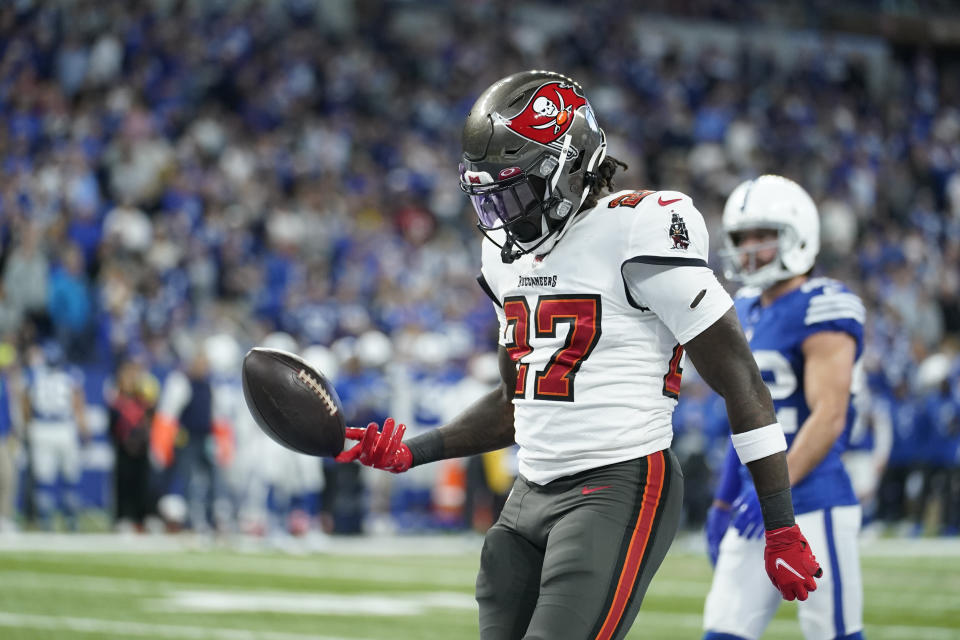 Tampa Bay Buccaneers' Ronald Jones (27) reacts after rushing for a touchdown during the second half of an NFL football game against the Indianapolis Colts, Sunday, Nov. 28, 2021, in Indianapolis. (AP Photo/Michael Conroy)