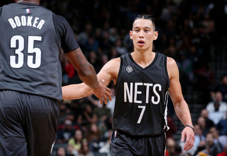New Nets Jeremy Lin and Trevor Booker are already paying dividends. (Getty Images)