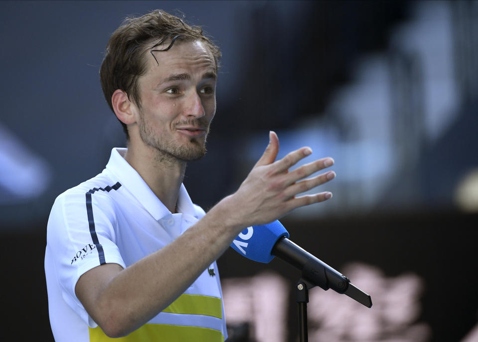 Russia's Daniil Medvedev is interviewed after defeating compatriot Andrey Rublev in their quarterfinal match at the Australian Open tennis championship in Melbourne, Australia, Wednesday, Feb. 17, 2021.(AP Photo/Andy Brownbill)