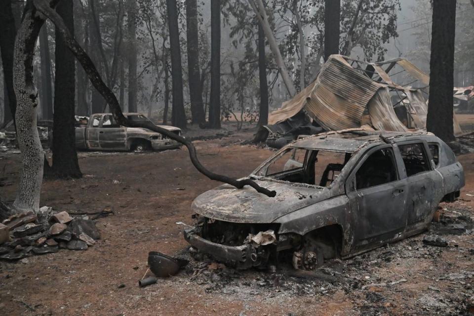 The remains of cars and a housing structure left from the Dixie Fire on Indian Falls Road in the Indian Falls community of Plumas County, Calif., on Friday, July 30, 2021.