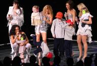 The Spice Kids make an appearance alongside their moms on February 18, 2008. Three-year-old Cruz Beckham plays up to the crowd by showing off his breakdancing moves. (Splash News)