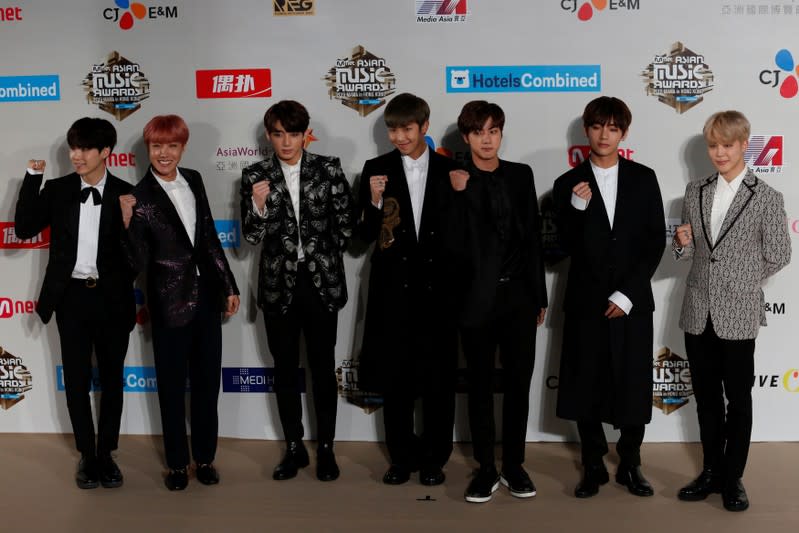 Members of South Korean K-pop band BTS pose during Mnet Asian Music Awards in Hong Kong