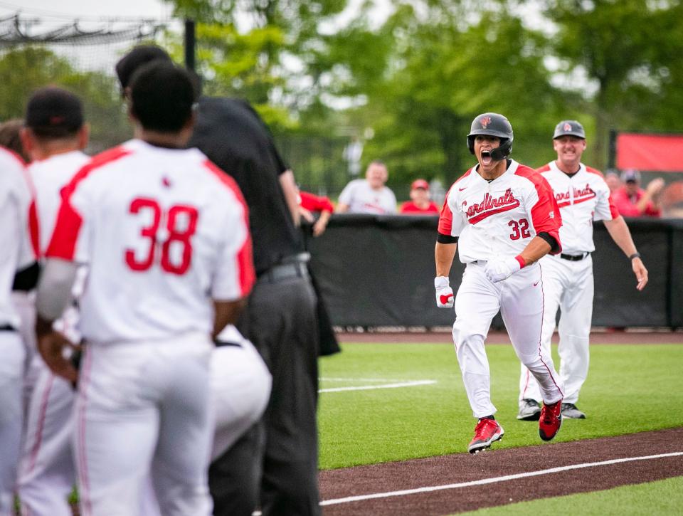 Ball State's Hunter Dobbins celebrates after hitting a walk-off two-run home run during a Mid-American Conference Tournament game against Ohio at Ball Diamond at First Merchants Ballpark Thursday, May 26, 2022.