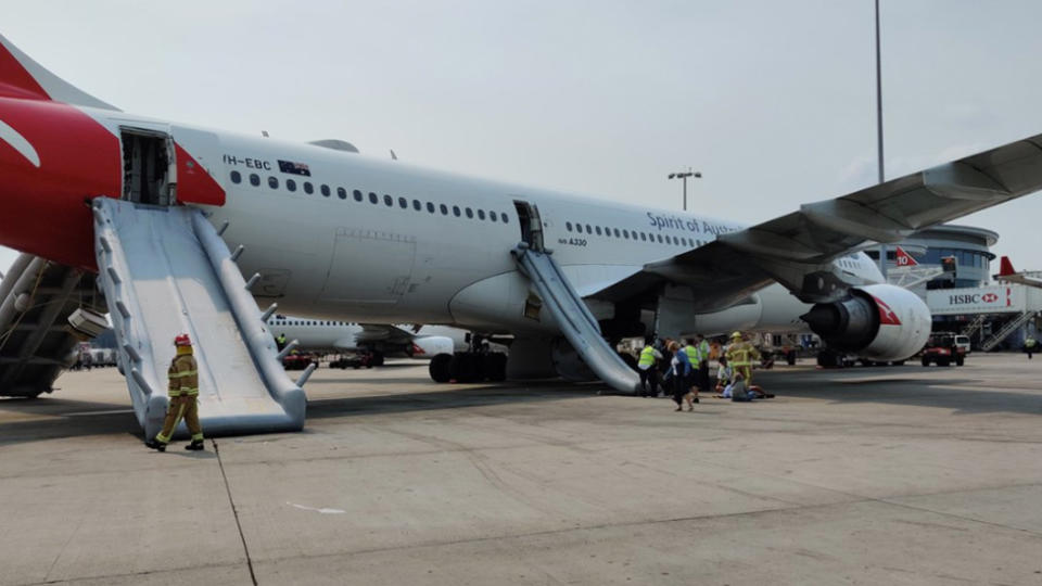 A photo of Qantas plane QFA575, which was evacuated after the cabin allegedly filled with smoke and the captain told crew and passengers to evacuate.