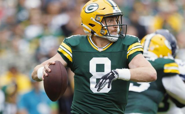 Aug 26, 2023; Green Bay, Wisconsin, USA; Green Bay Packers quarterback Sean Clifford (8) looks to throw a pass during the second quarter against the Seattle Seahawks at Lambeau Field. Mandatory Credit: Jeff Hanisch-USA TODAY Sports