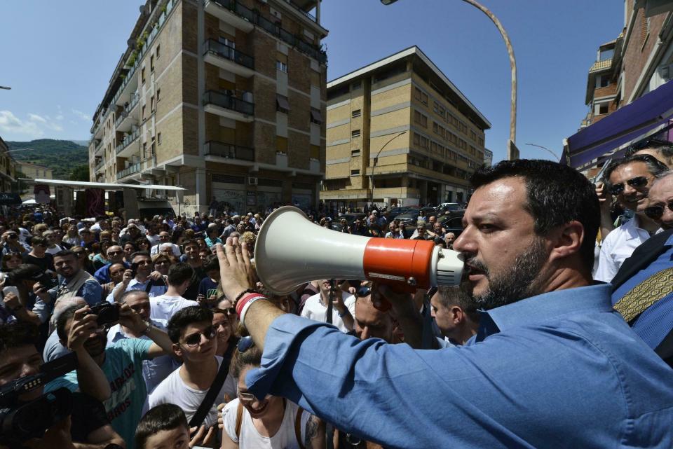 Italian Deputy Premier and Interior Minister Matteo Salvini addresses a rally in Ascoli Piceno, Italy, Wednesday, June 5, 2019. The European Commission recommended Wednesday that legal action be launched against Italy because it failed to respect EU debt rules last year and is likely to do so again in 2019 and 2020, setting up a new confrontation with the populist government in Rome. The Italian government only won commission approval for its 2019 budget plan late last year. After some early defiance from Salvini, Rome agreed to reduce the deficit to acceptable levels. (Sandro Perozzi/ANSA via AP)