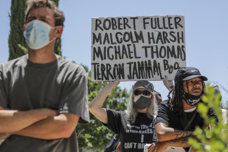 A rally after the deaths of Fuller and Thomas took place outside Supervisor Kathryn Barger's Lancaster office last June.