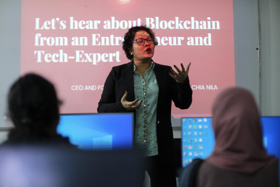 Achia Nila, founder of 'Women in Digital' technology center addresses a workshop at a university in Dhaka, Bangladesh, Dec. 26, 2023. Nila said many youngsters feel frustrated with corruption and bureaucracy and prefer to migrate to other countries because of “better opportunities”. Ahead of the Jan. 7 vote being boycotted by the main opposition, Prime Minister Sheikh Hasina is trying to woo the country’s first-time voters by carrying forward her government’s “Digital Bangladesh” project and promising a “smart Bangladesh” by 2041. (AP Photo/Mahmud Hossain Opu)