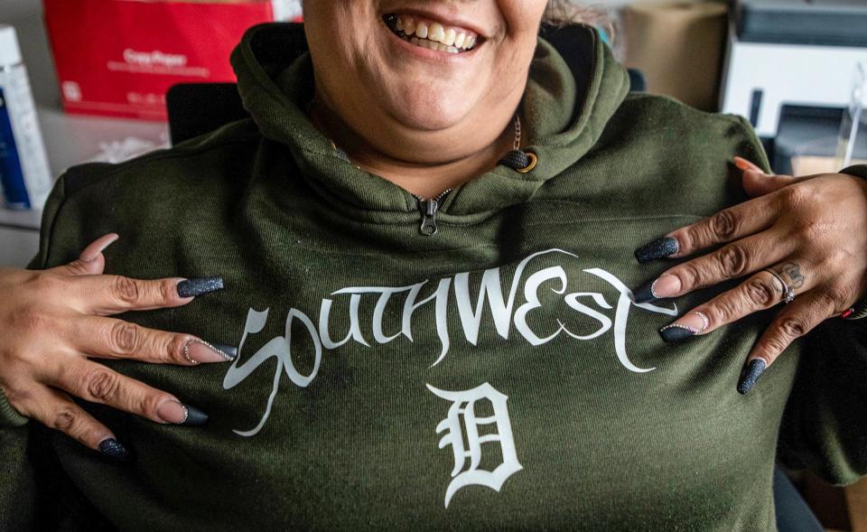 Lisa Gonzalez, a southwest Detroit native, sits down inside the Patton Recreation Center in Detroit on Wednesday, Dec. 7, 2022. 