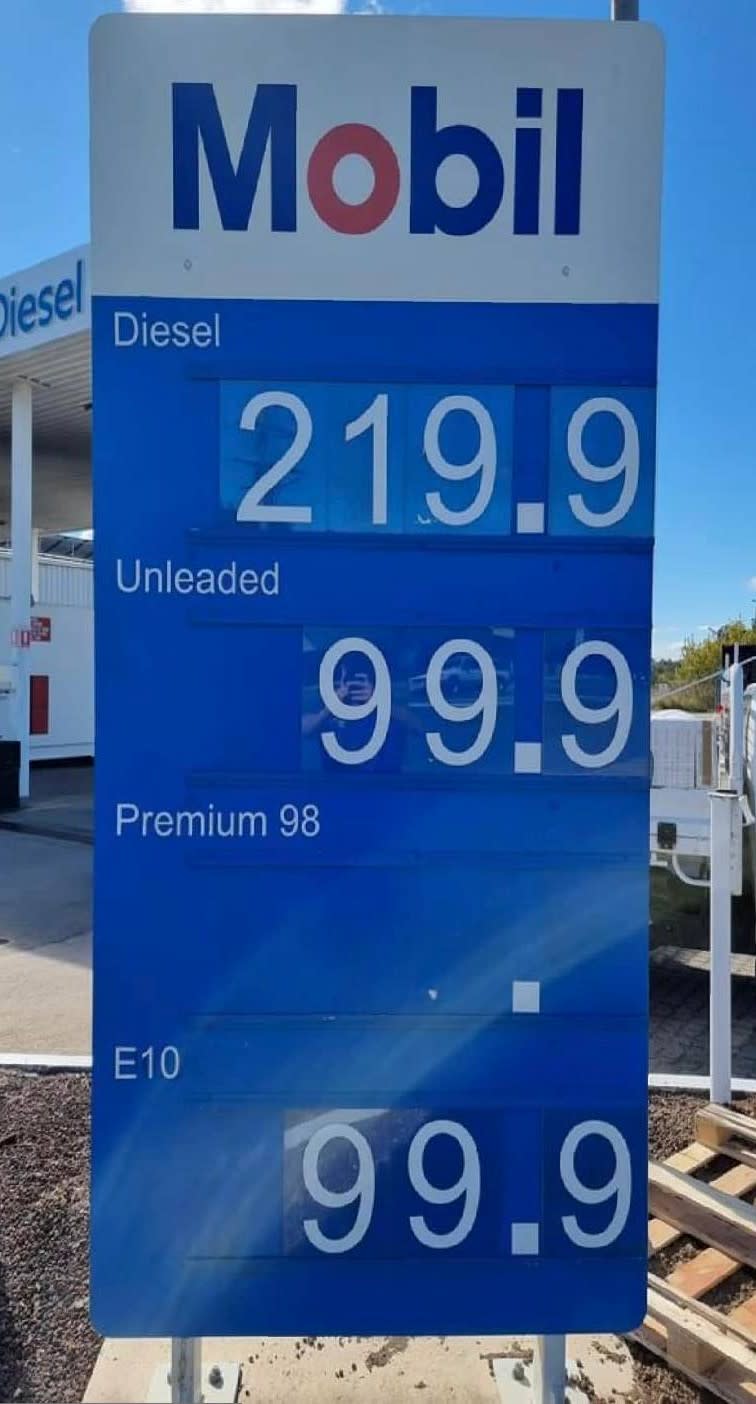 Motorist's photograph showing unleaded petrol for only 99.9c per litre