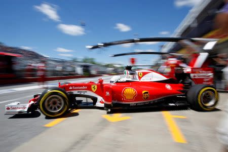 Formula One - Canadian Grand Prix - Montreal, Quebec, Canada - 10/6/16 - Ferrari F1 driver Sebastian Vettel attends the second practice. REUTERS/Chris Wattie - RTSH009