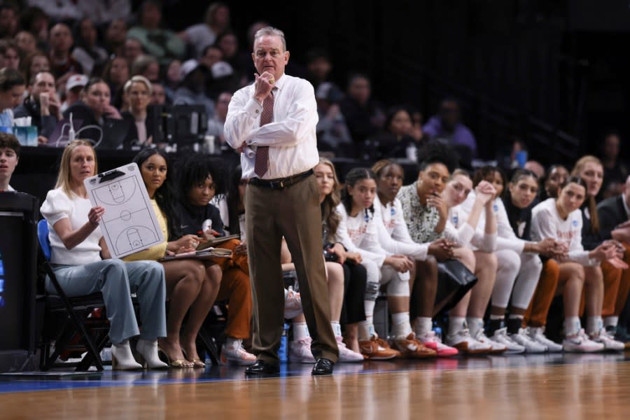 Texas coach Vic Schaefer watches during the second half of the team’s Elite Eight college basketball game against North Carolina State in the women’s NCAA Tournament, Sunday, March 31, 2024, in Portland, Ore. (AP Photo/Howard Lao)
