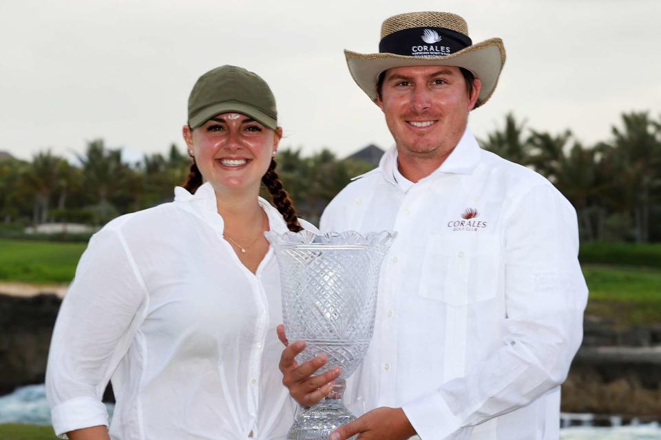 <p>Kevin C. Cox/Getty</p> Joel Dahmen and Lona Dahmen at the Corales Puntacana Resort & Club Championship on March 28, 2021.