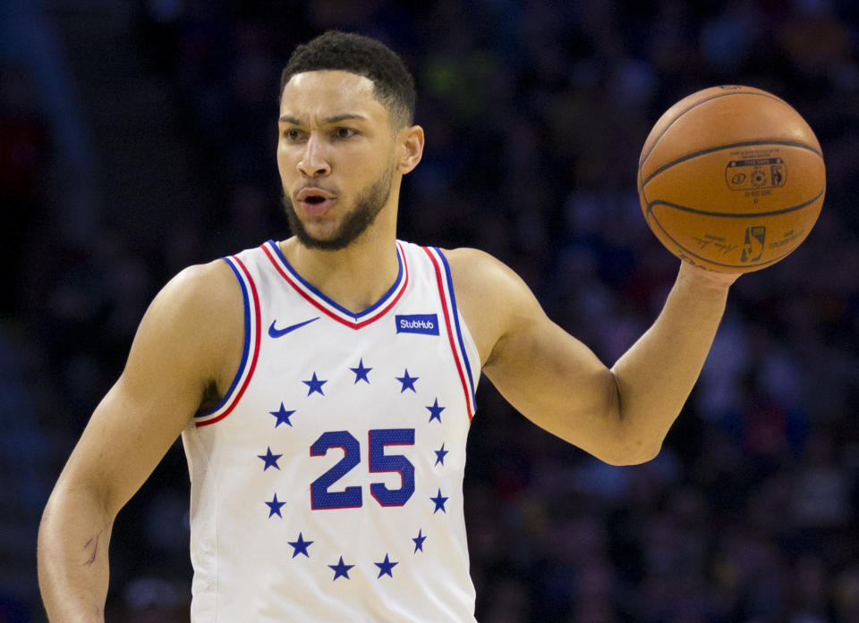 Ben Simmons examines the defense against the Los Angeles Lakers in the first quarter at the Wells Fargo Center on Sunday. (Photo by Mitchell Leff/Getty Images)