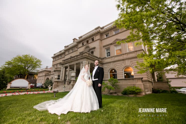 Bride poses in great-grandmother’s dress from 1910, her grandmother’s from 1947, her mom’s from 1973, and her mother-in-law’s from 1967. Pictured: Her actual wedding dress. (Photo: Jeannine Marie Photography)