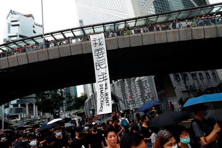 Anti-extradition bill protesters march in Hong Kong