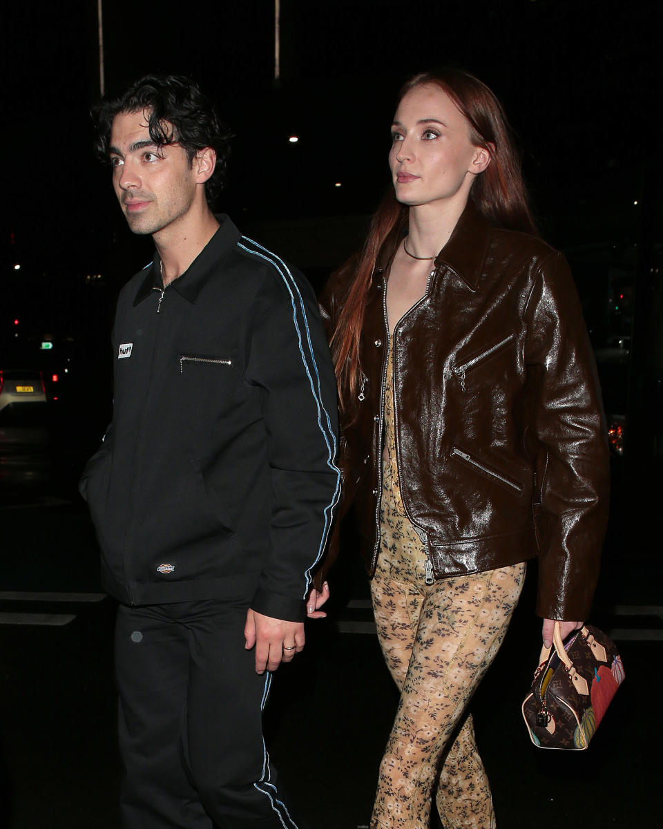 Joe Jonas and Sophie Turner walking hand in hand