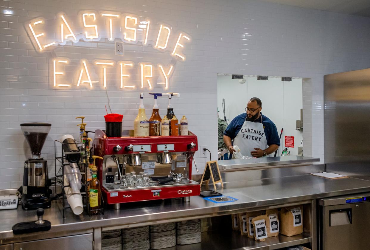 Dante Manson works April 20, 2021, at the Eastside Eatery kitchen inside The Market at EastPoint, 1708 NE 23 in Oklahoma City. The grocery store provides food, discounted pricing on dairy, and farm to market produce to the east side of Oklahoma City, which has been classified as a food desert.