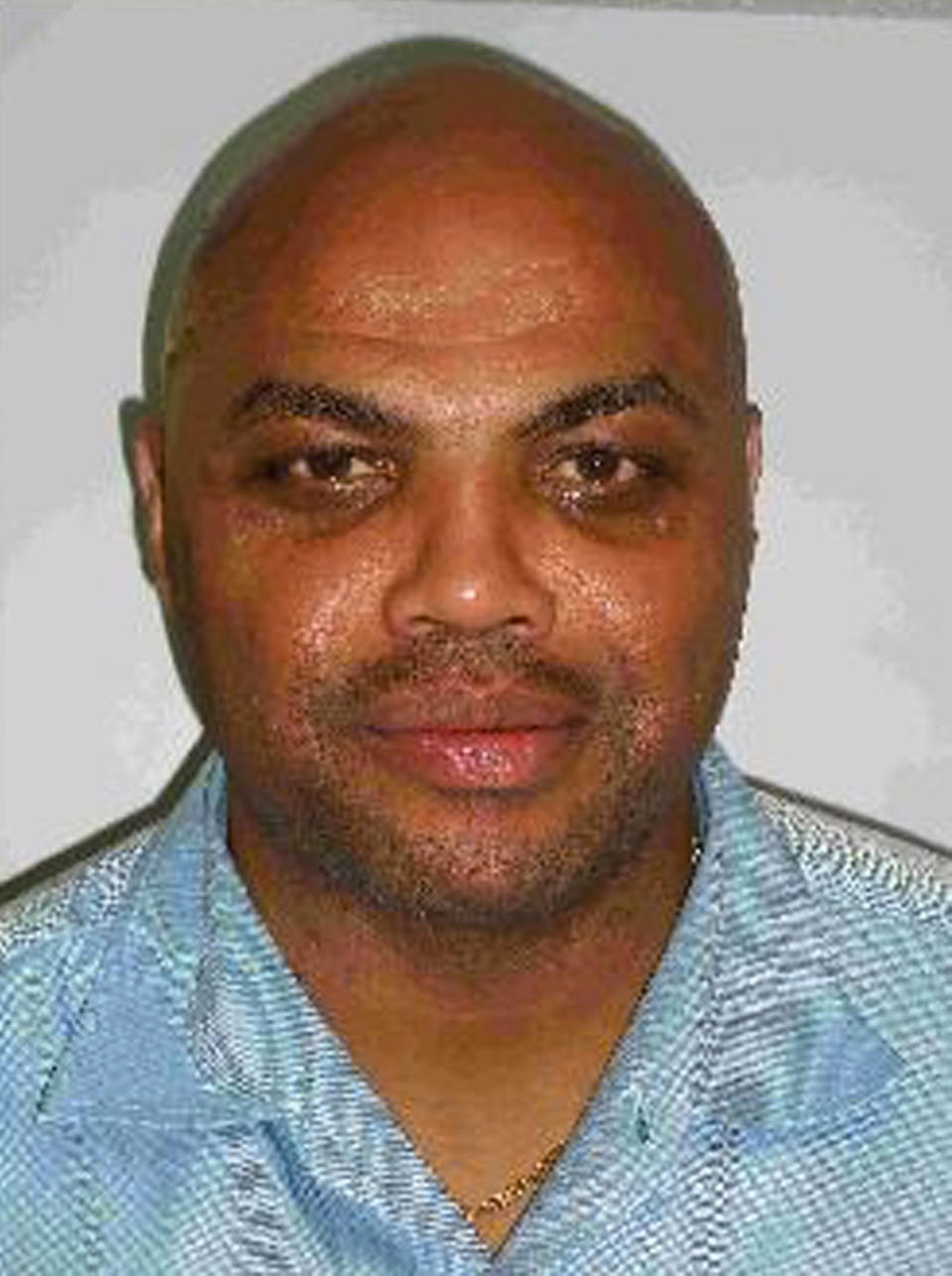 Charles Barkley is seen in Scottsdale, Ariz. on Wednesday, Dec. 31, 2008 in a booking photo provided by the Gilbert Police Department. Barkley was arrested on suspicion of driving under the influence of alcohol. An officer with a law enforcement task force that targets drunken driving saw the former NBA star run a stop sign around 1:30 a.m. (AP Photo/Gilbert Police Department)