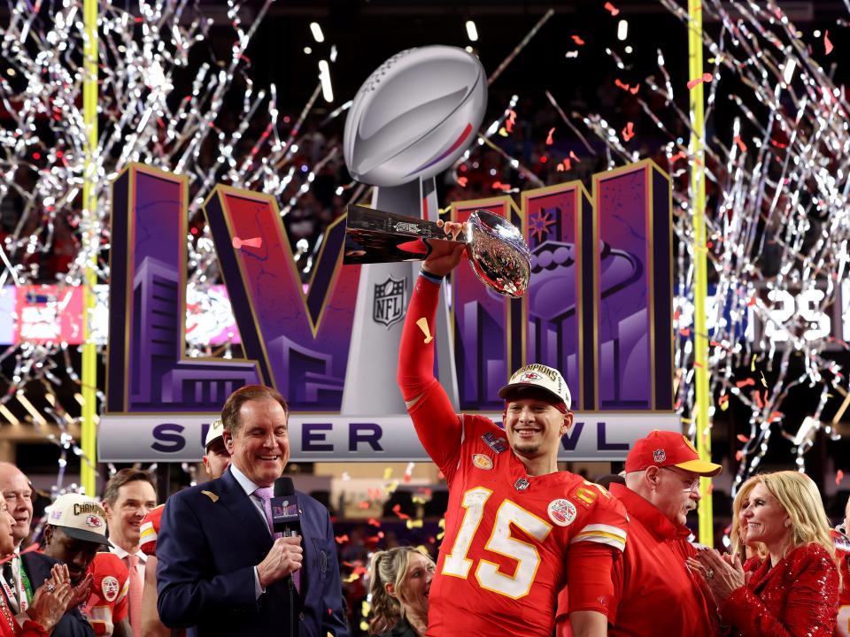 Patrick Mahomes of the Kansas City Chiefs holds the Lombardi Trophy after defeating the San Francisco 49ers 25-22 during Super Bowl LVIII