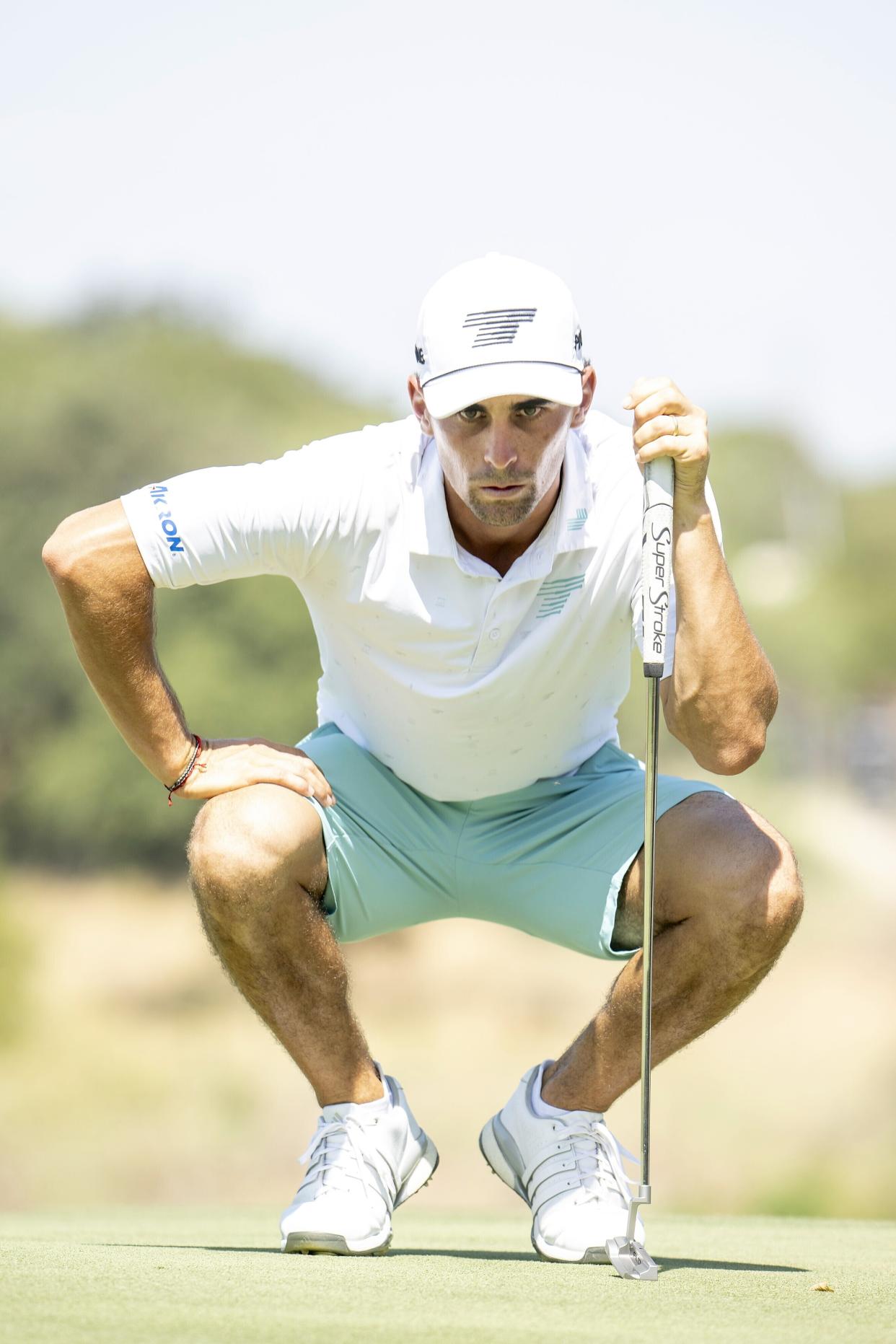 Captain Joaquín Niemann, of Torque GC, reads his putt on the eighth green during the quarterfinals of LIV Golf Team Championship Dallas at Maridoe Golf Club, Friday, Sept. 20, 2024, in Carrollton, Texas. (Charles Laberge/LIV Golf via AP)