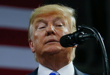 FILE PHOTO: U.S. President Donald Trump speaks at a Make America Great Again rally at the Civic Center in Charleston, West Virginia, U.S., August 21, 2018. REUTERS/Leah Millis