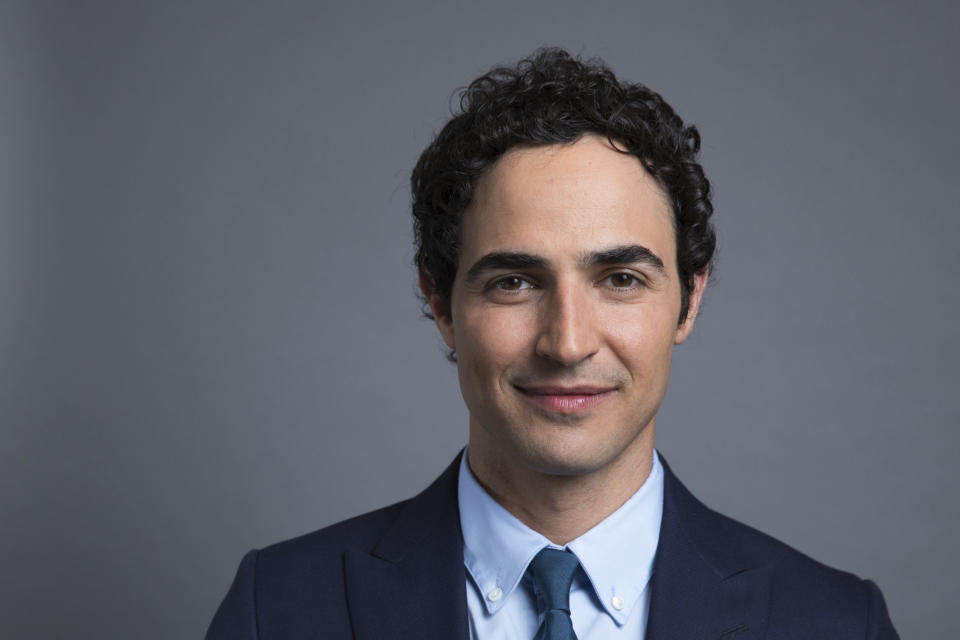 FILE - In this July 31, 2017 file photo, Zac Posen poses for a photo to promote his new documentary, "House of Z" in New York. Posen is shutting down his namesake label. Posen, 39, said he was “deeply saddened that the journey of nearly 20 years has come to an end.” He launched his label in 2001. (Photo by Amy Sussman/Invision/AP, File)