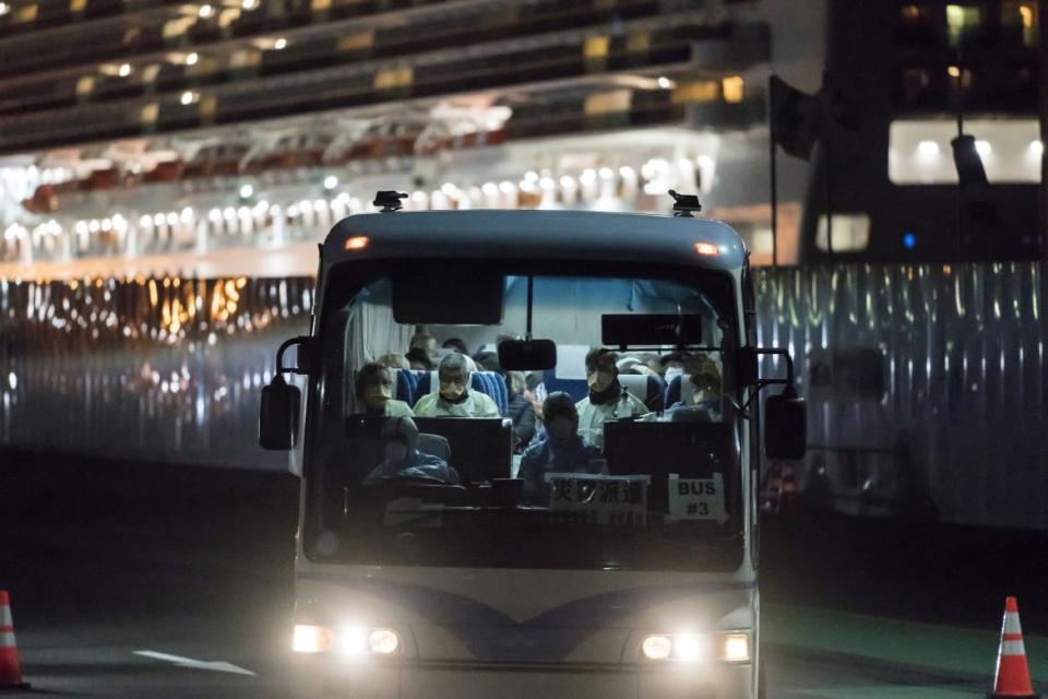 <div class="inline-image__caption"><p>Australians evacuated on a government chartered bus.</p></div> <div class="inline-image__credit">Tomohiro Ohsumi/Getty</div>