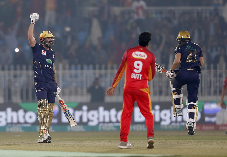 Quetta Gladiators batsmen Ben Cutting, left, and Muhammad Nawaz, right, react after taking winning run during the Pakistan Super League T20 cricket match against Islamabad United at Rawalpindi Stadium, in Rawalpindi, Pakistan, Thursday, Feb. 27, 2020. (AP Photo/Anjum Naveed)